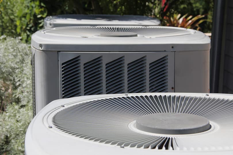 Couple of Home Central Heating Ventilation and Air Conditioner Outdoor Units.